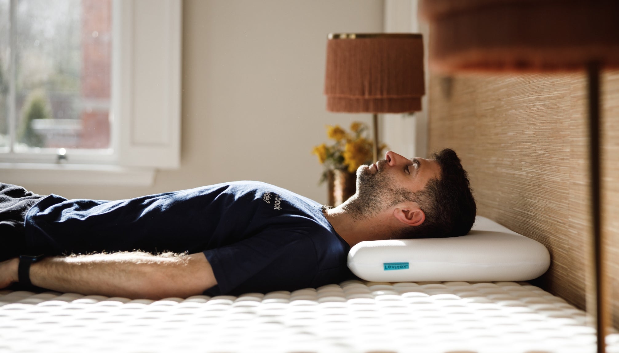 man sleeping on his back