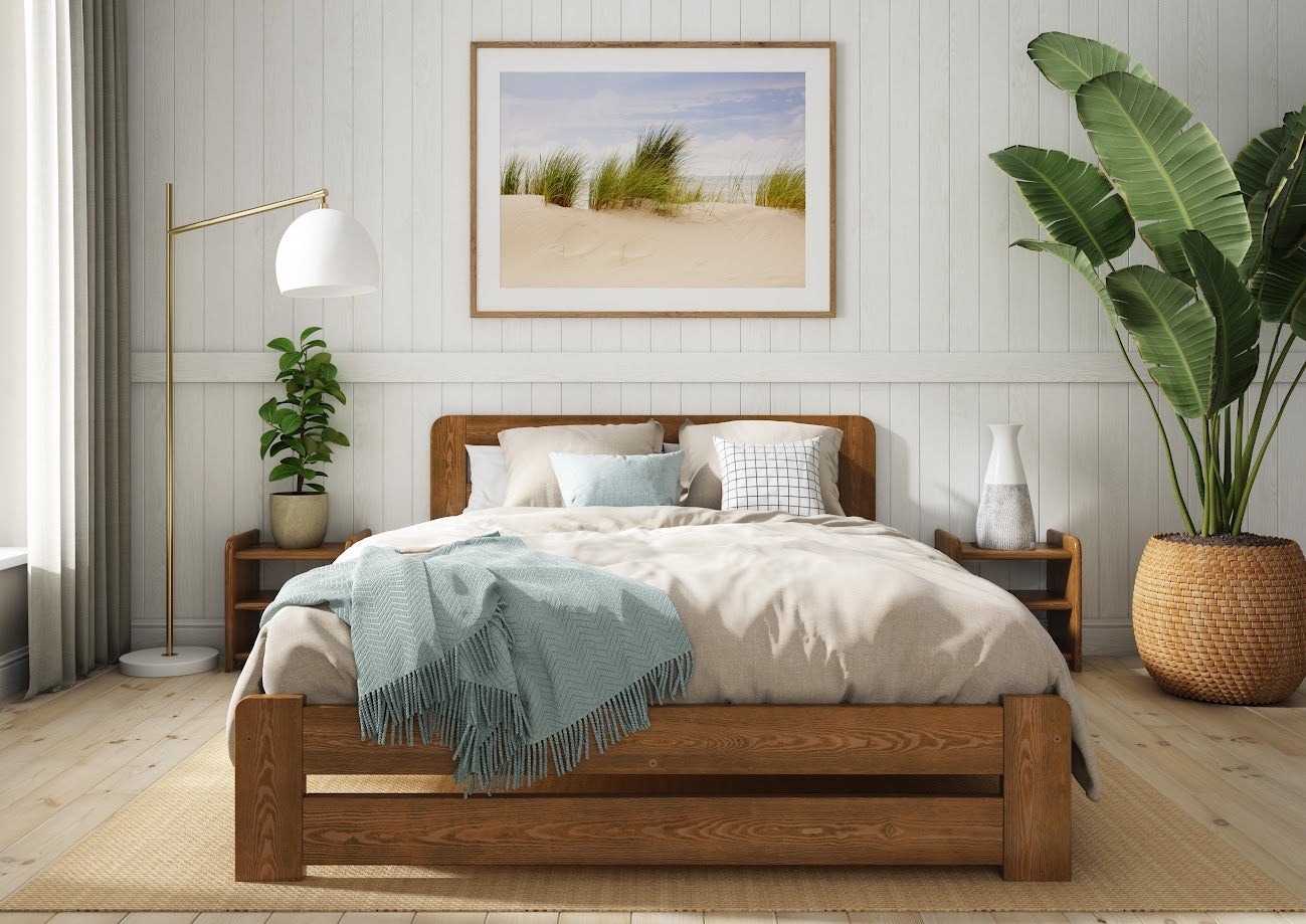 bedroom with a wooden bed frame in the centre