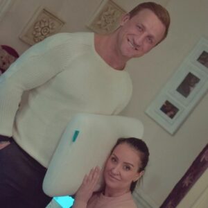 famous couple keith mason and riona kelly posing with a levitex in their bedroom